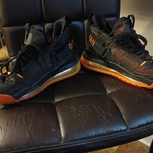 Jordan Men's Black and Orange High-Top Sneakers with Translucent Orange Sole